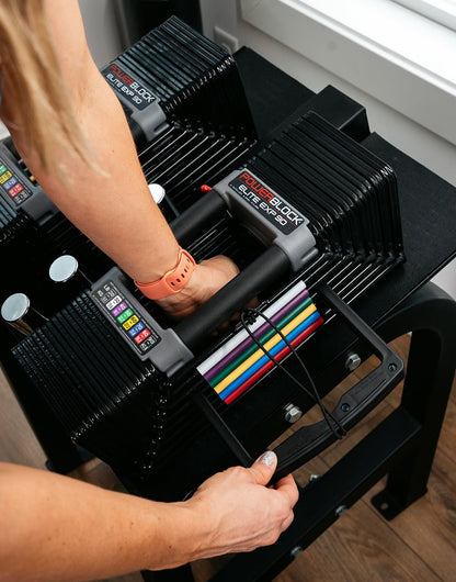 PowerBlock Elite EXP dumbbells, adjustable 5–50lbs, compact, durable all-in-one weights.